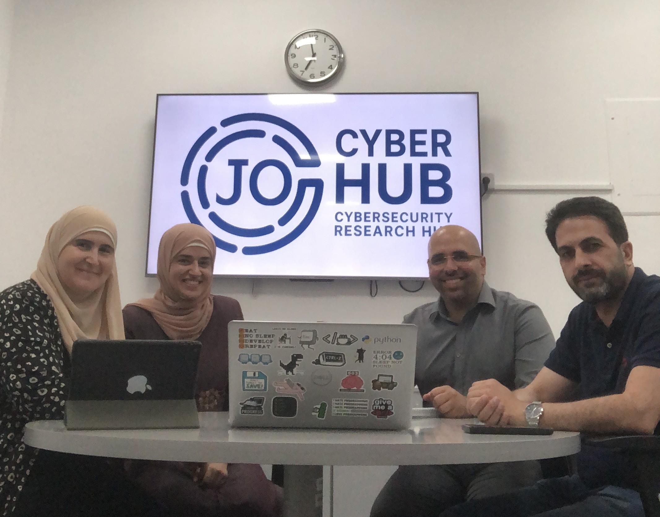 CyberHubJo members collaborating during a workshop session