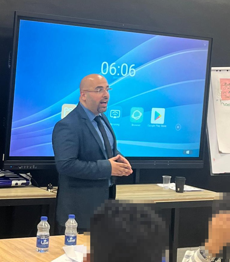 CyberHubJo team posing at an event space